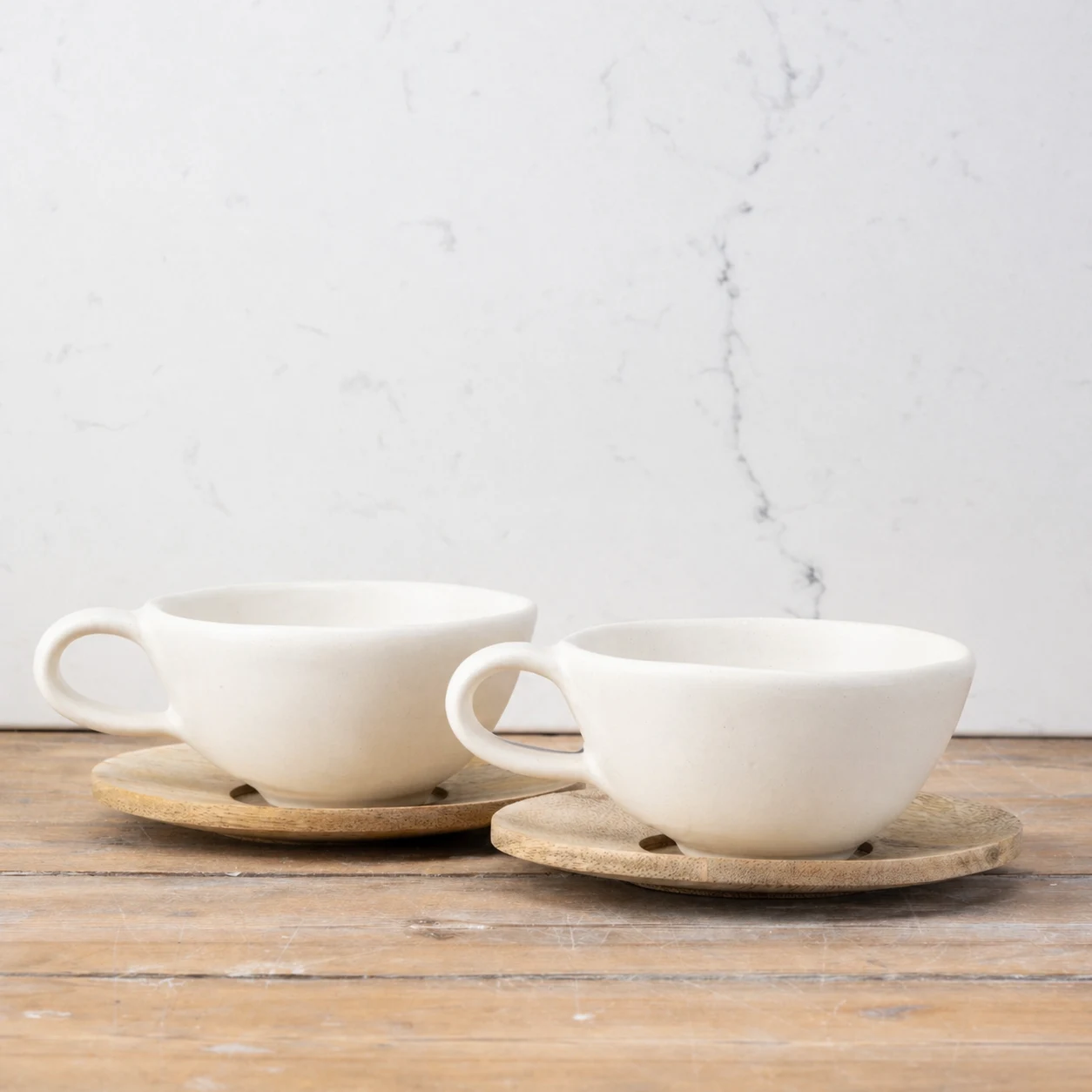 2 Milk Wonky mugs with wooden saucers